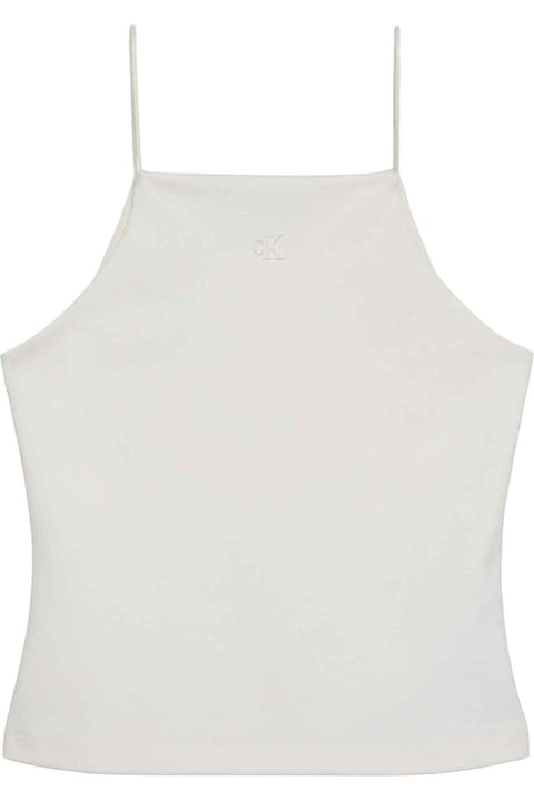 بلوز کرم زنانه Calvin Klein جنس پارچه بافت تخت پنبه‌ای بند نازک Slim Fit
