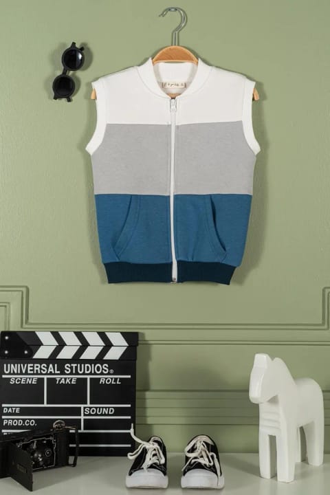 جلیقه دخترانه آبی با زیپ، جیب کانگورویی و حاشیه تزئینی