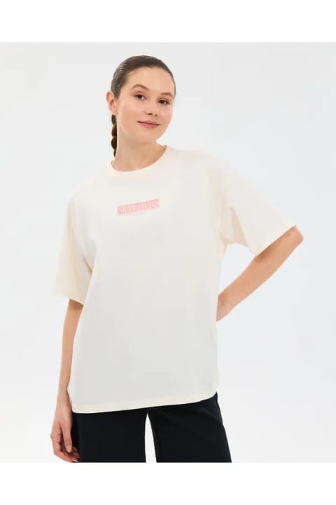 تیشرت اسکچرز زنانه مدل Oversize Fit طرح گرافیکی سفید S2610063-3855